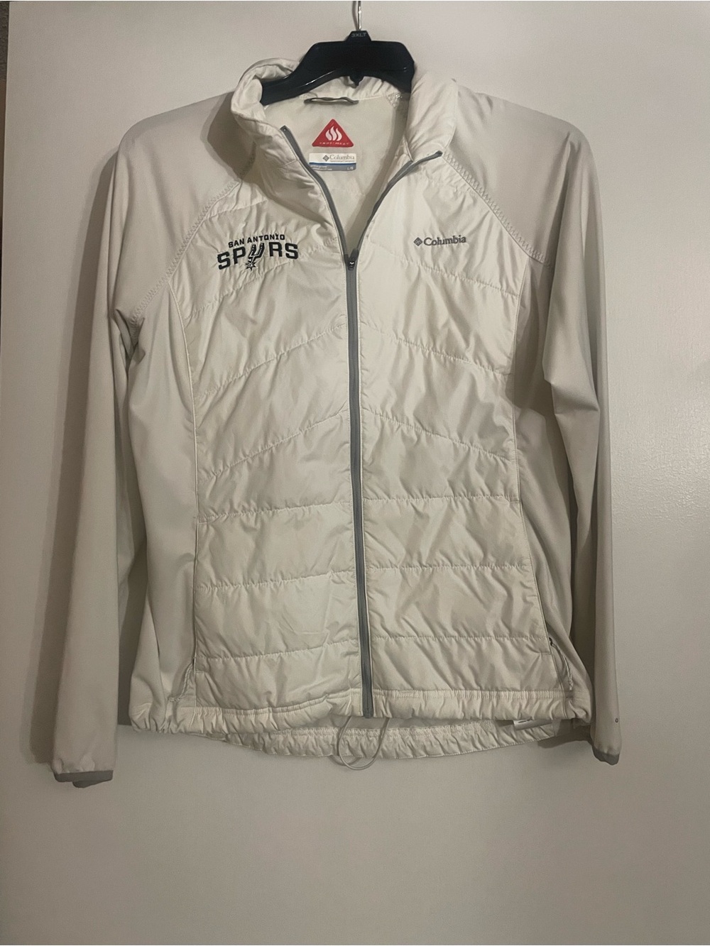 Columbia Women's Cream Lightweight Puffer Jacket with Spurs Logo